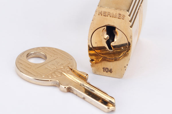 Hermès golden steel padlock with keys Gold hardware ref.267081 - Joli Closet