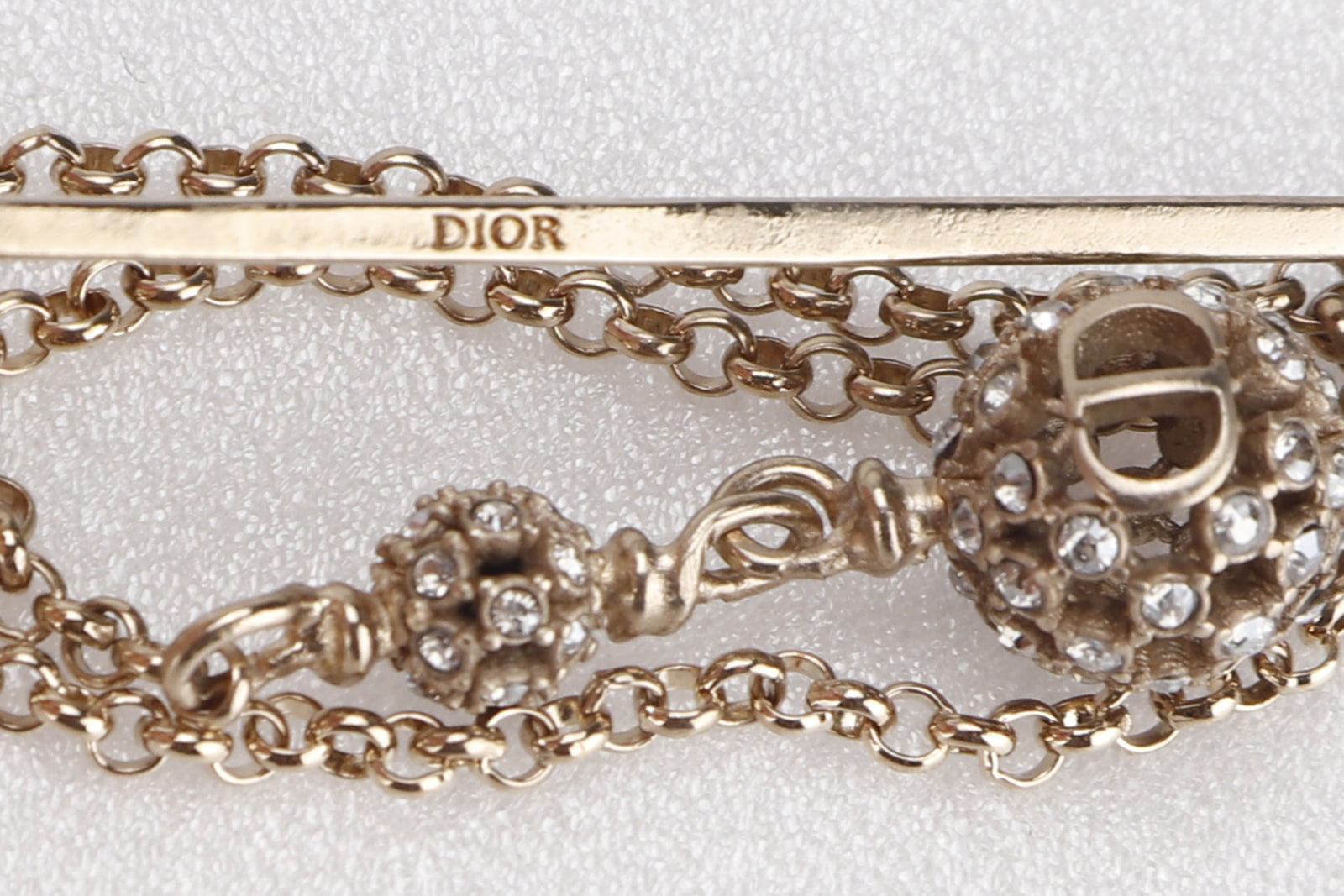 christian dior woman brooch pin ball & stones, with dust cover & box