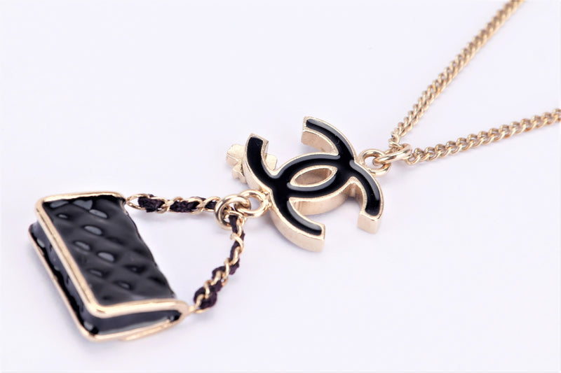 CHANEL BLACK CC WITH BAG MOTIF NECKLACE LIGHT GOLD PLATED, WITH BOX