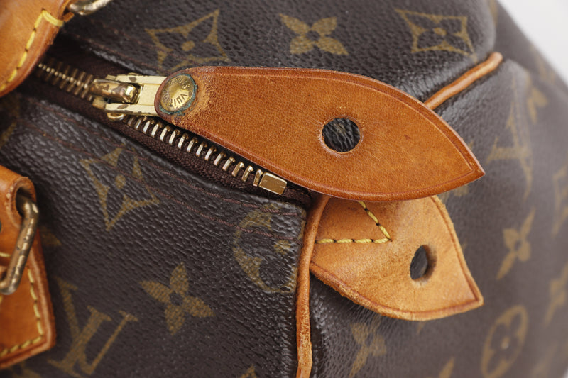 Louis Vuitton golden lock for Speedy handbag