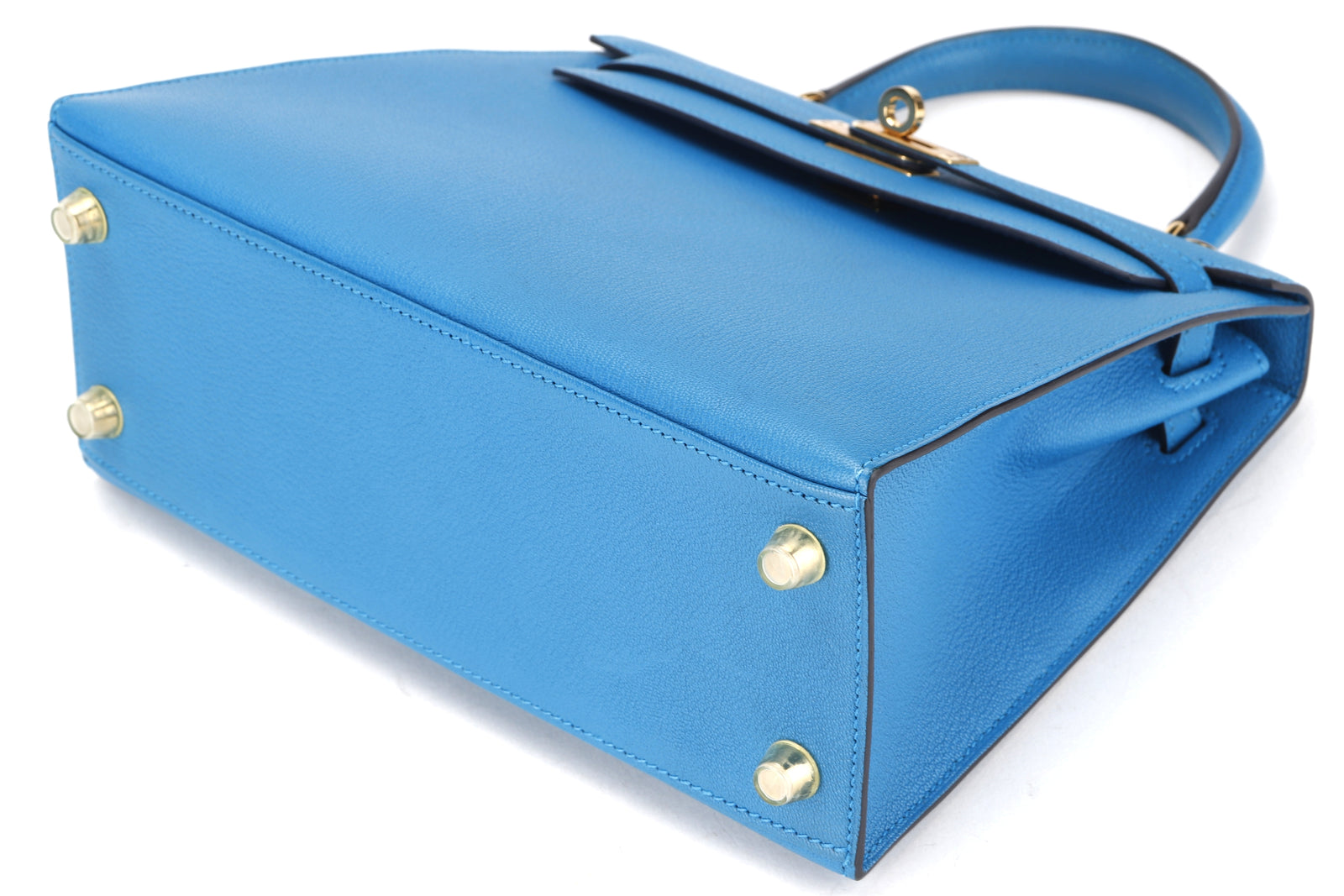 hermes kelly 25cm (stamp c) blue zanzibar chevre leather gold hardware, with keys, lock, strap, raincoat, dust cover & box hermes kelly 25cm (stamp c) blue zanzibar chevre leather gold hardware, with keys, lock, strap, raincoat, dust cover & box