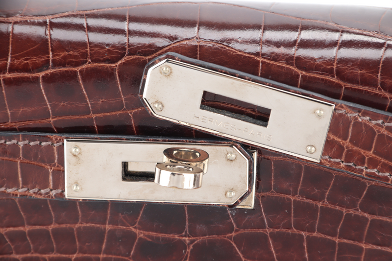 HERMES KELLY 32 SELLIER DARK BROWN SHINY NILOTICUS SILVER HARDWARE STAMP P (YEAR 2012) WITH KEYS, LOCK, STRAPS, RAINCOAT WITH DUST COVER