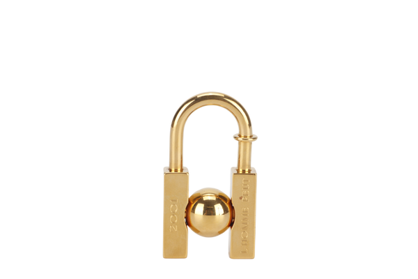 HERMES GOLD PLATED EMBELLIR LA TERRE LOCK CHARM WITH BOX