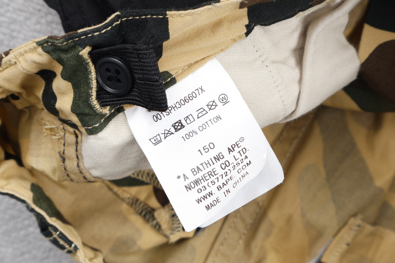 A BATHING APE 1ST CAMO CARGO KIDS SHORTS YELLOW SIZE 150