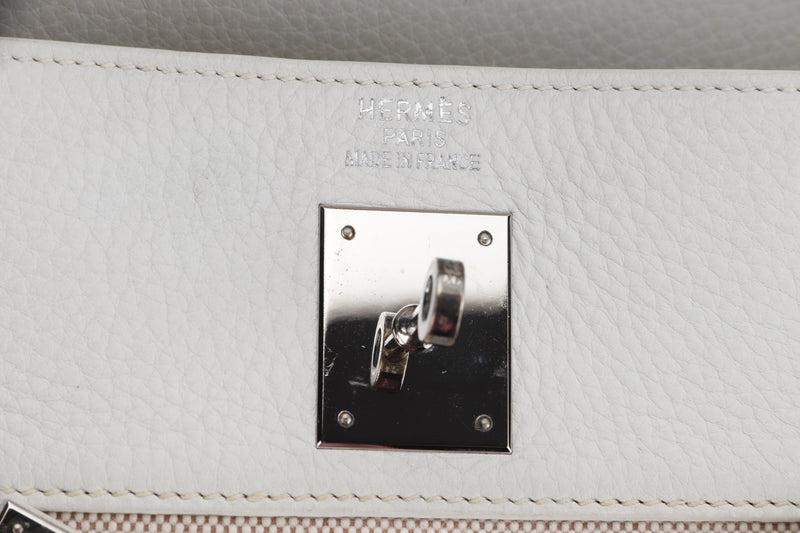 HERMES KELLY 35CM (STAMP F YEAR 2002) RETOURN TOILE & WHITE CLEMENCE LEATHER, PALLADIUM HARDWARE, WITH LOCK, KEYS & DUST COVER, NO STRAP