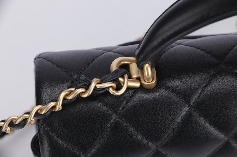 Chanel 23A Black Shiny Lambskin Top Handle Small Flap Bag with Gold Hardware.  
