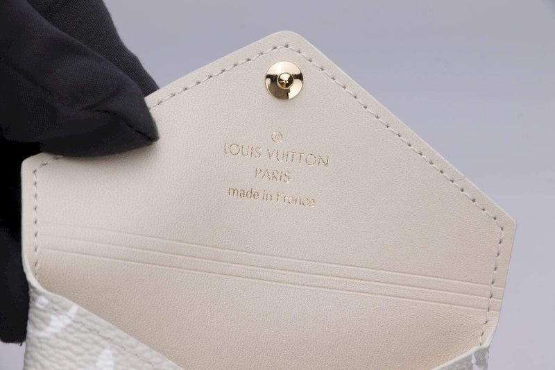 Louis Vuitton Mini Monogram Pochette — Le Grand Strip