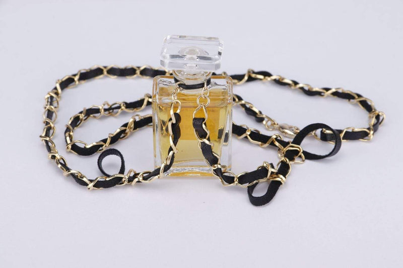 2004 Vintage CHANEL Gold Toned CC Chain Necklace Resin No5 Perfume For  Sale at 1stDibs  chain 2004 chanel bottle necklace chanel no 5 necklace